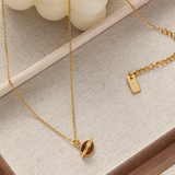 Halskette mit Tigerauge-Anhänger und Zirkonia-Kristall